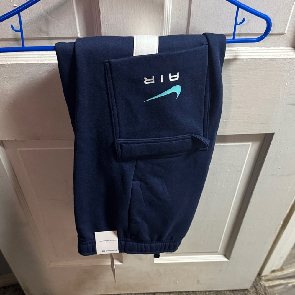 Nike Kids Dark Blue Joggers with Teal Logo